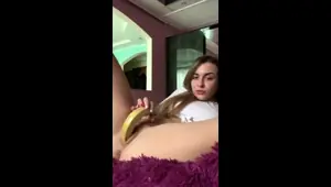 Hot amateur teen girl toying pussy in bed on webcam