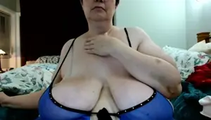 Busty curly brunette with big boobs fucks on couch