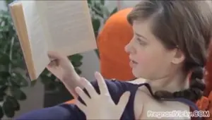 Horny pregnant babe fingers herself lovingly