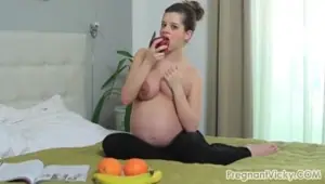 Horny pregnant woman masturbates on her own