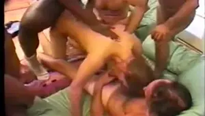 Slutty MILF takes on a group of guys and loves it all