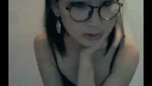 Young Asian showing off her sweet little tits