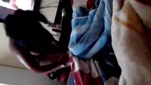 Sexy South African woman stepping out of the shower