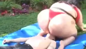 Huge girl smothers and squashes a guy outdoors