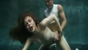 Hot brunette gets fucked under water
