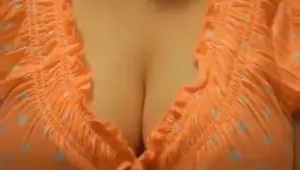 Indian woman teases with her big boobs