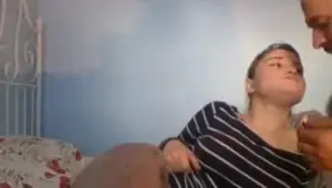 She bends over and lets him play with her holes