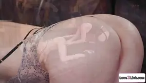 Busty milf gets whipped by a dominatrix