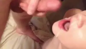 Raunchy slag sucking two big dicks