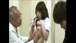 Old Japanese doctor examines schoolgirl