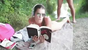 She's caught sunbathing naked and ends up stuffed with cock