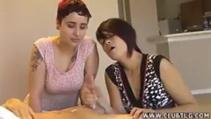 Tattooed chick having naughty threeway fun