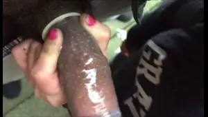 sucking his bbc with a condom