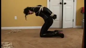 tied babe in latex johannie