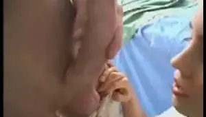 horny nurse takes care of her patient's hard on