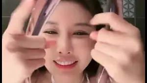 asian cowgirl plays with her tight wet pussy