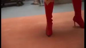 superheroines supergirl and shazam girl battle each other