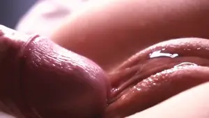 SLOW MOTION. Extremely close up. Sperm dripping down the pussy
