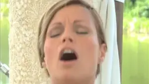 Beautiful woman reaches her orgasm outdoors