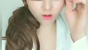 An amateur Japanese teacher breaks pantyhose and masturbates with a dildo full of saliva.