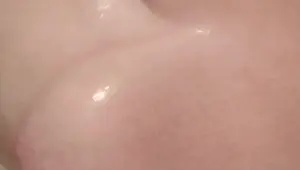 Playing with wet titties in shower More on OF