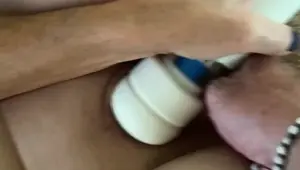 Beautiful MILF love her wand while being fingered