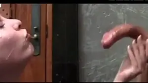 Redhead whore gets streams of cum on her face and mouth