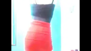 Sexy girl in red skirt does strip tease