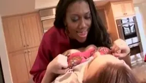 Black milf with blonde teen in lesbian action