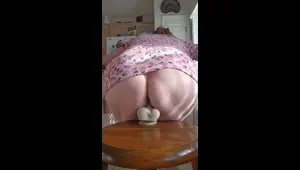 Older MILF rides a bwc dildo on a stool in the kitchen til she cums all over it
