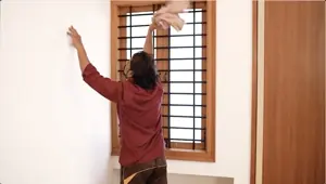 The servant was wearing Malik's shirt and pants.