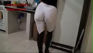 Lady in shiny white lycra leggings